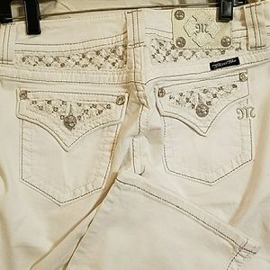 White boot cut Miss Me Jeans with rhinestones